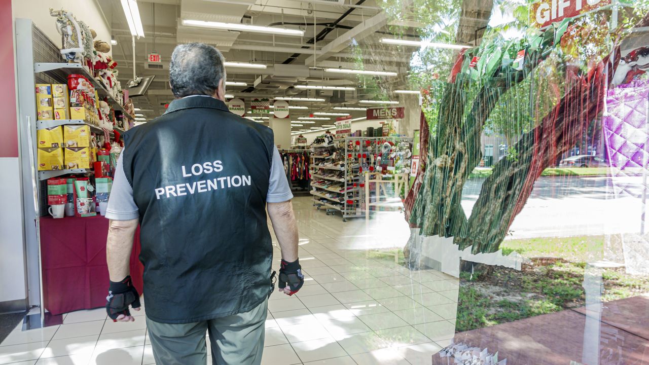 A loss prevention security guard to prevent theft is seen at the Target discount department store in Miami Beach, Florida, on October 31, 2023.