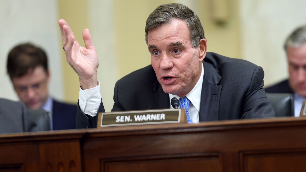 Sen. Mark Warner delivers remarks during a Rules Committee hearing at the Russell Senate Office Building on November 14, 2023 in Washington, DC.