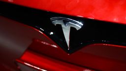 Tesla logo is seen on a car at the showroom in Santa Monica, California.