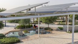 Solar panels double as shade for walkways at Masdar City on November 3, 2023 in Abu Dhabi, United Arab Emirates.