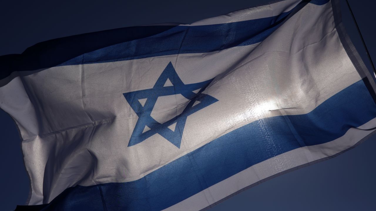 WASHINGTON, DC - NOVEMBER 14: An Israel flag flies during the March for Israel on the National Mall November 14, 2023 in Washington, DC. The large pro-Israel gathering comes as the Israel-Hamas war enters its sixth week following the October 7 terrorist attacks by Hamas. (Photo by Alex Wong/Getty Images)