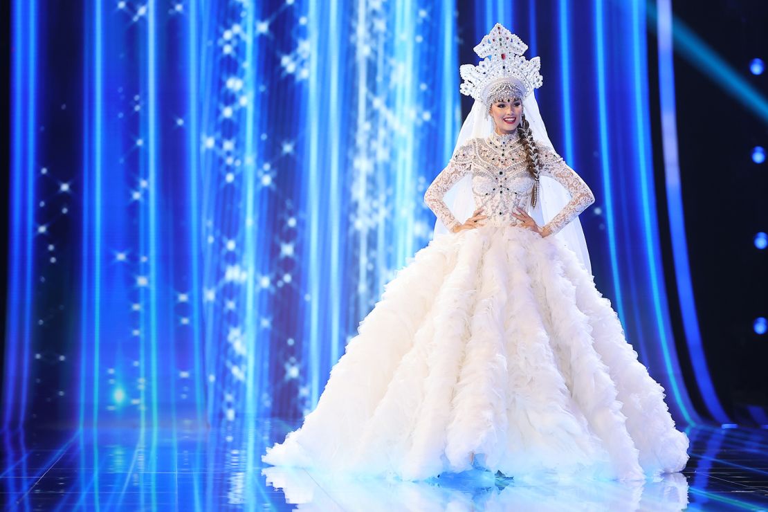 A borderline bridal moment from Miss Russia, who wore an intricately beaded white gown, veil and crown.