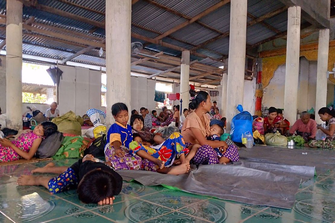 Dozens of displaced families lie on mats as they shelter at a Rakhine State monastery in November.