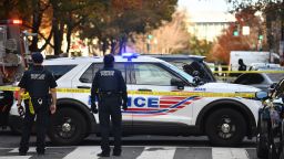 WASHINGTON, D.C., NOVEMBER 22: Police investigate a shooting incident in which a DC Police officer was involved in Washington, D.C., November 22, 2023, at 12th and M streets in NW. (Astrid Riecken For The Washington Post via Getty Images)
