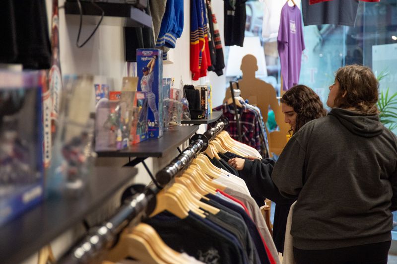 Shopper browse clothes at the Polaris Fashion Place mall on Black Friday in Columbus, Ohio, on November 24, 2023.