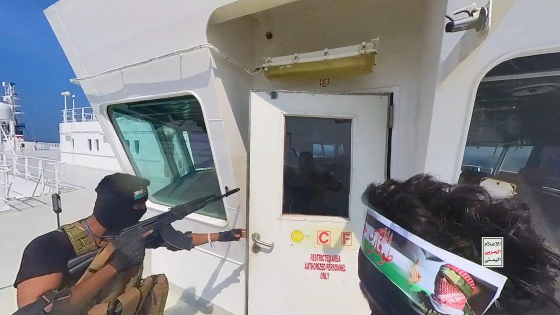 This handout screen grab captured from a video shows Yemen's Houthi fighters' takeover of the Galaxy Leader Cargo in the Red Sea coast off Hudaydah, on November 20 in the Red Sea, Yemen.