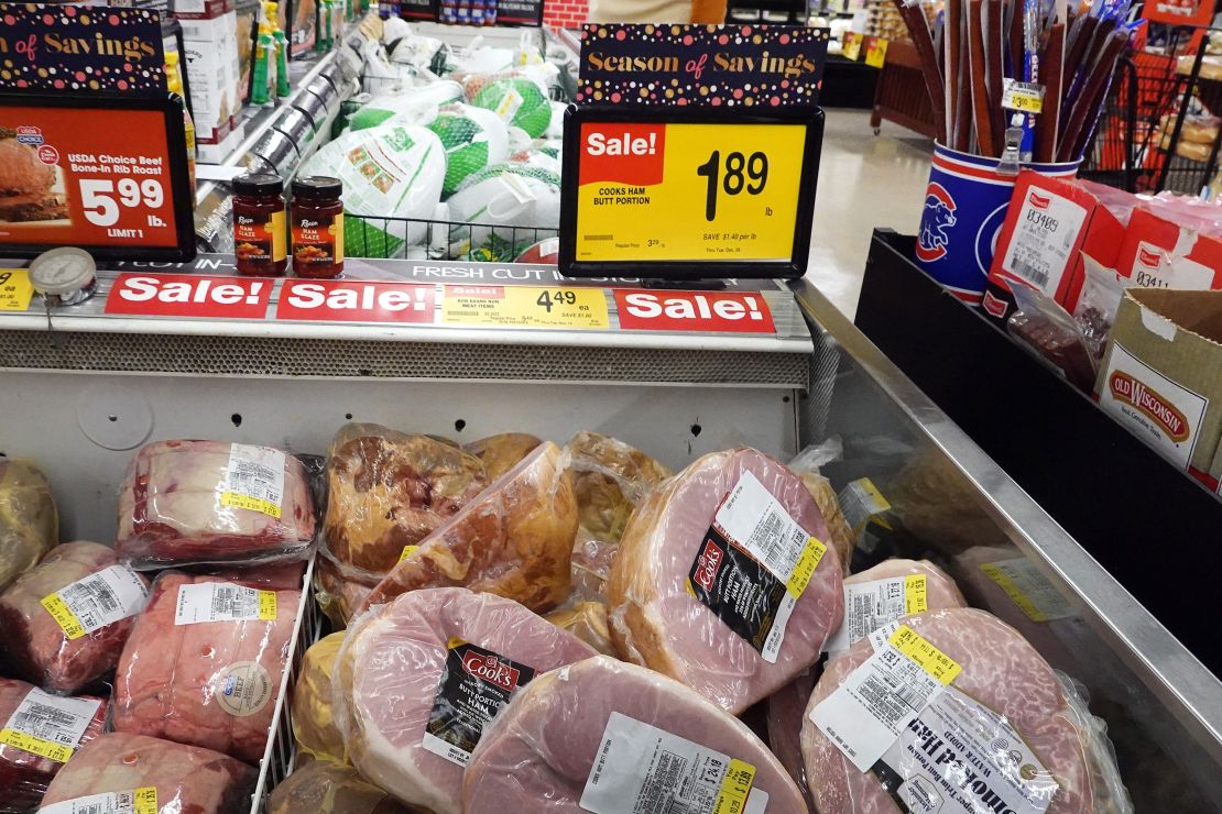 Hams are offered for sale at a grocery store ahead of the Thanksgiving Holiday on November 20, 2023 in Chicago, Illinois.