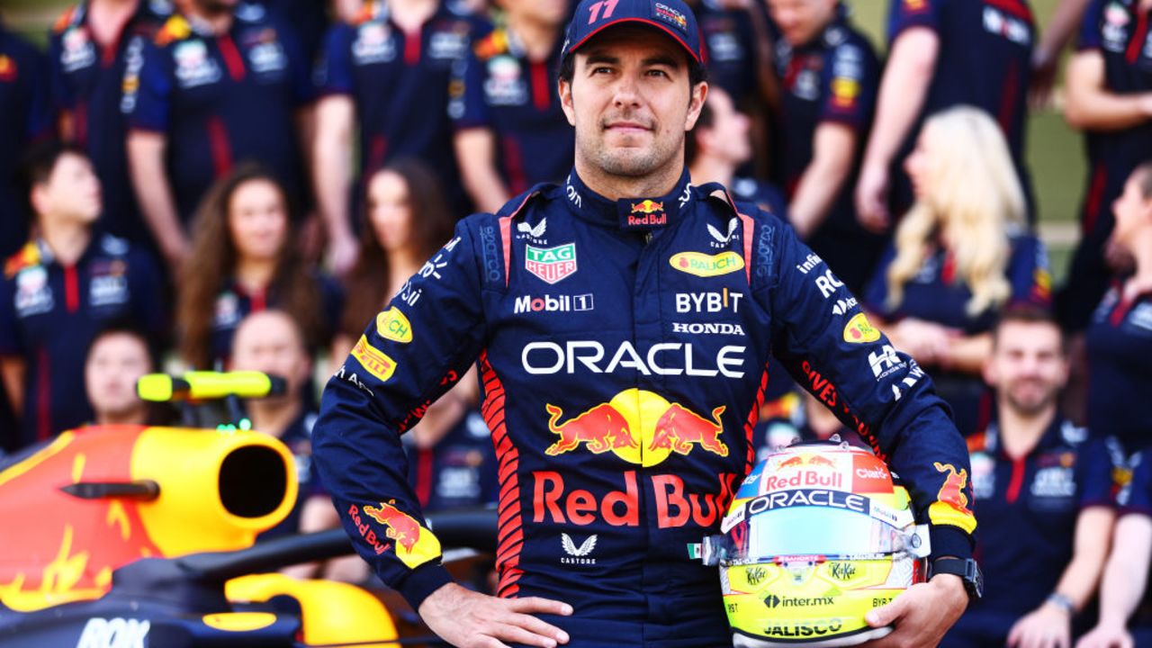 ABU DHABI, UNITED ARAB EMIRATES - NOVEMBER 26: Sergio Perez of Mexico and Oracle Red Bull Racing poses at the Red Bull Racing Team Photo prior to the F1 Grand Prix of Abu Dhabi at Yas Marina Circuit on November 26, 2023 in Abu Dhabi, United Arab Emirates. (Photo by Clive Rose/Getty Images)