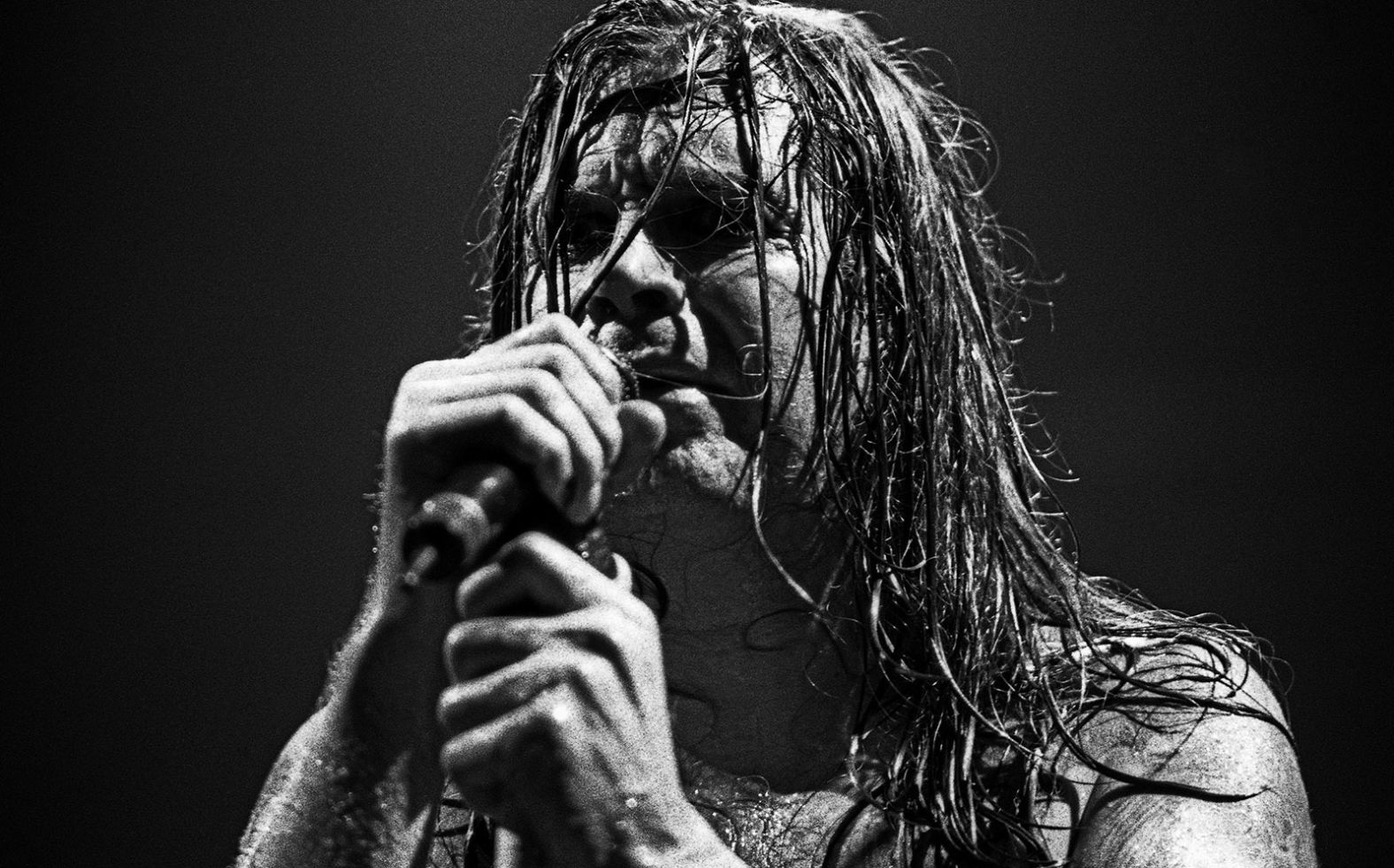 Osbourne performs on stage in 1997.