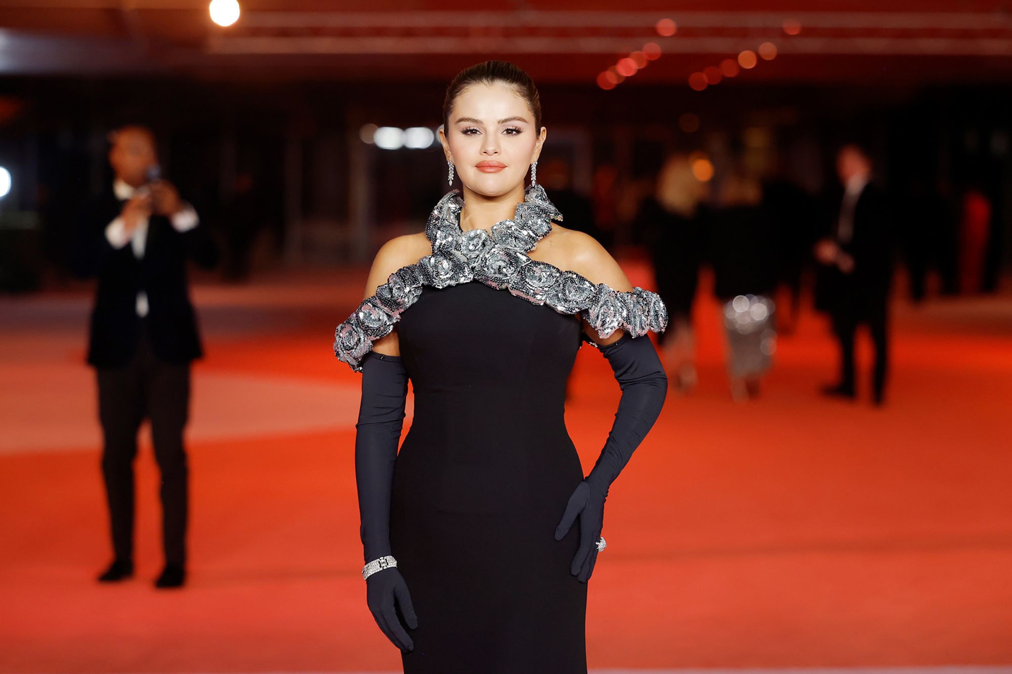 Selena Gomez at the Academy Museum of Motion Pictures Gala in Los Angeles, California. Gomez was one of a number of celebrities in evening gloves.
