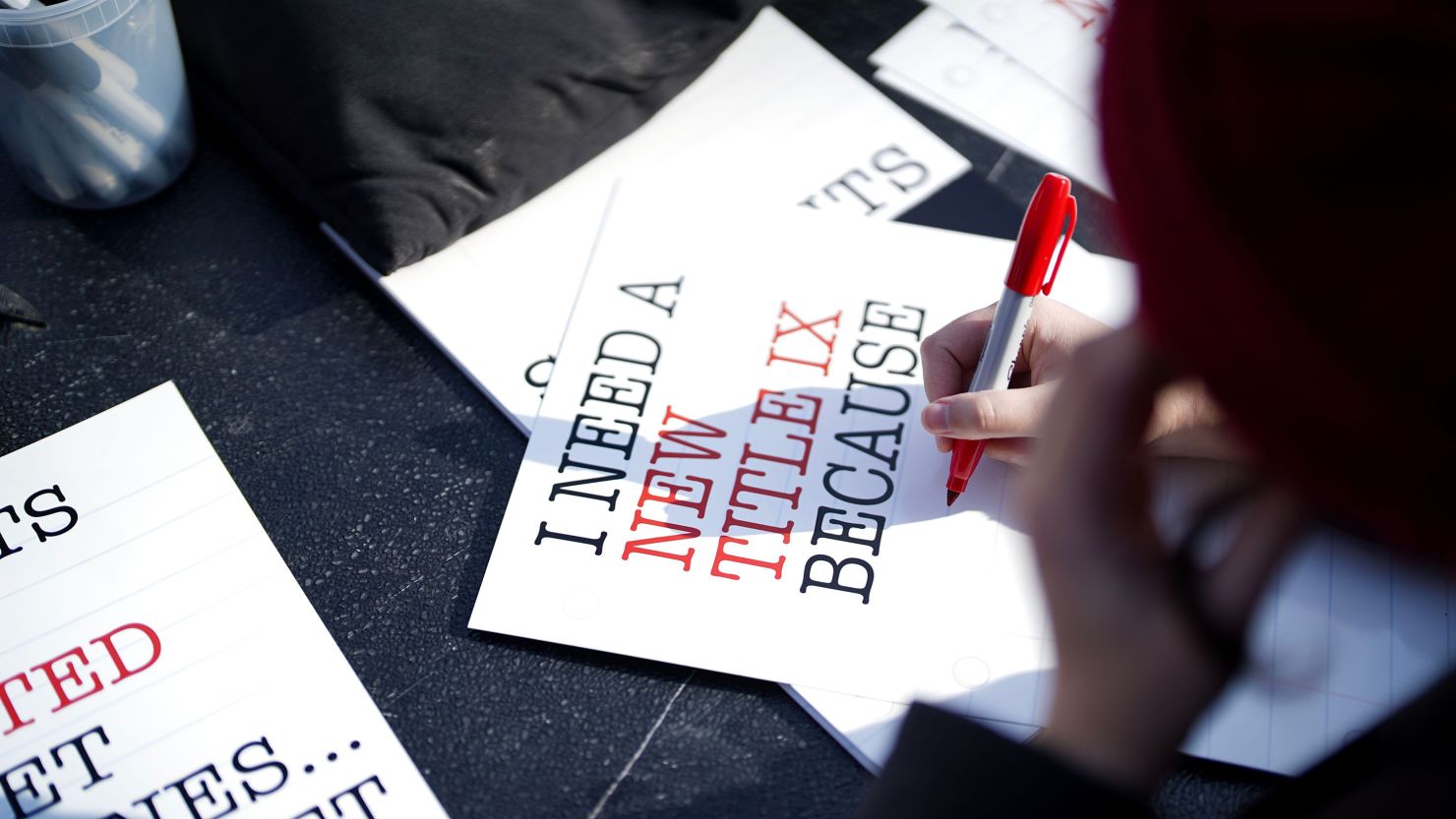 Students, parents, educators and advocates gather in front of the White House to press the Biden Administration to release a long-awaited final Title IX rule on December 5, 2023 in Washington.