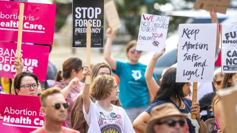 People gather near Robert F. Stephens Courthouse Plaza in downtown Lexington, Kentucky, on June 24, 2022, to protest the U.S. Supreme Court's overturning of Roe v. Wade. (Ryan C. Hermens/Lexington Herald-Leader/Tribune News Service via Getty Images)