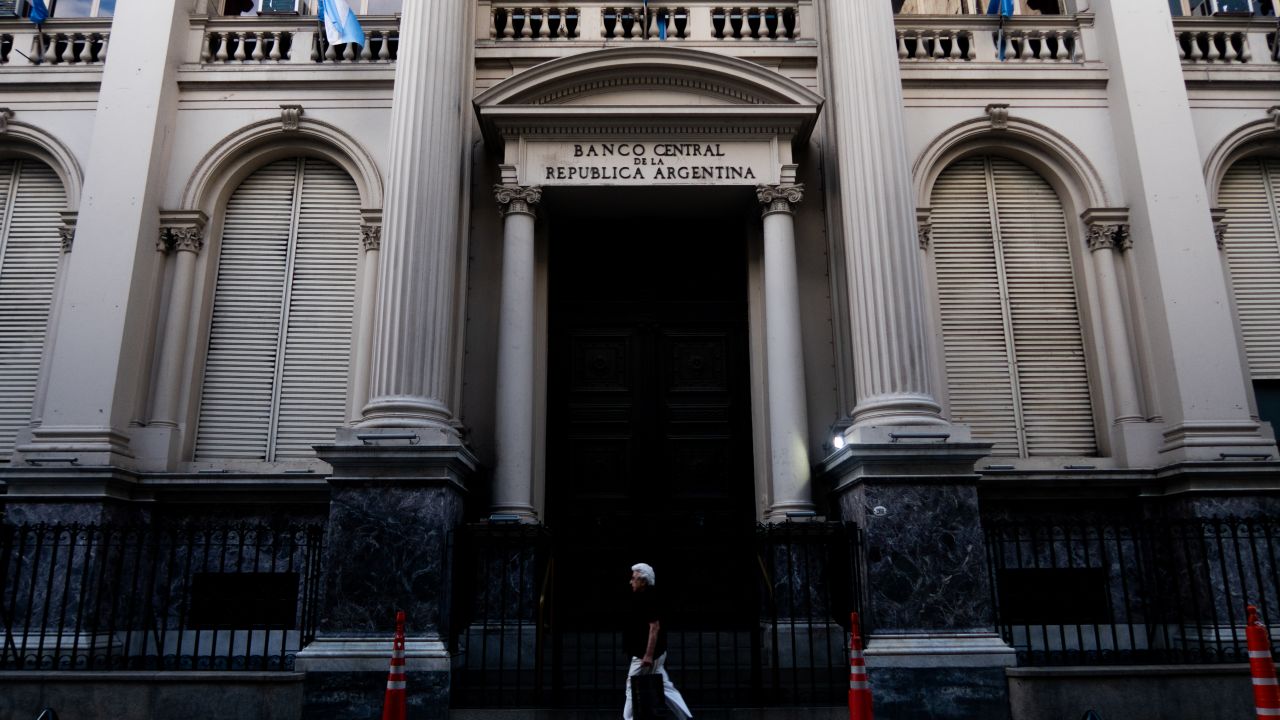 BUENOS AIRES, ARGENTINA - NOVEMBER 30: A man walks by the Argentine Central Bank on November 30, 2023 in Buenos Aires, Argentina. President-elect Javier Milei of La Libertad Avanza will take office on Sunday 10, replacing incumbent peronist Alberto Fernandez. Milei is a self-described "anarcho-capitalist" libertarian who wants to sharply reduce the size of the State and replace the local peso with the American dollar. During the campaign, he promised to uproot Argentina's political establishment and to align the economy with dramatic measures such as closing the Central Bank. After defeating the current Minister of Economy Sergio Massa in the run-off with 55,65% of the votes, the president-elect has shown moderation and pragmatism as he works on the line up of his cabinet. The new administration will face the challenge to reduce the country's 140% annual inflation and its 44,7% of poverty, as recently announced by a study carried out by ODSA-UCA.  (Photo by Tomas Cuesta/Getty Images)