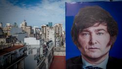 BUENOS AIRES, ARGENTINA - NOVEMBER 30: A Javier Milei picture is seen on a campaign sign on November 30, 2023 in Buenos Aires, Argentina. President-elect Javier Milei of La Libertad Avanza will take office on Sunday 10, replacing incumbent peronist Alberto Fernandez. Milei is a self-described "anarcho-capitalist" libertarian who wants to sharply reduce the size of the State and replace the local peso with the American dollar. During the campaign, he promised to uproot Argentina's political establishment and to align the economy with dramatic measures such as closing the Central Bank. After defeating the current Minister of Economy Sergio Massa in the run-off with 55,65% of the votes, the president-elect has shown moderation and pragmatism as he works on the line up of his cabinet. The new administration will face the challenge to reduce the country's 140% annual inflation and its 44,7% of poverty, as recently announced by a study carried out by ODSA-UCA.  (Photo by Tomas Cuesta/Getty Images)