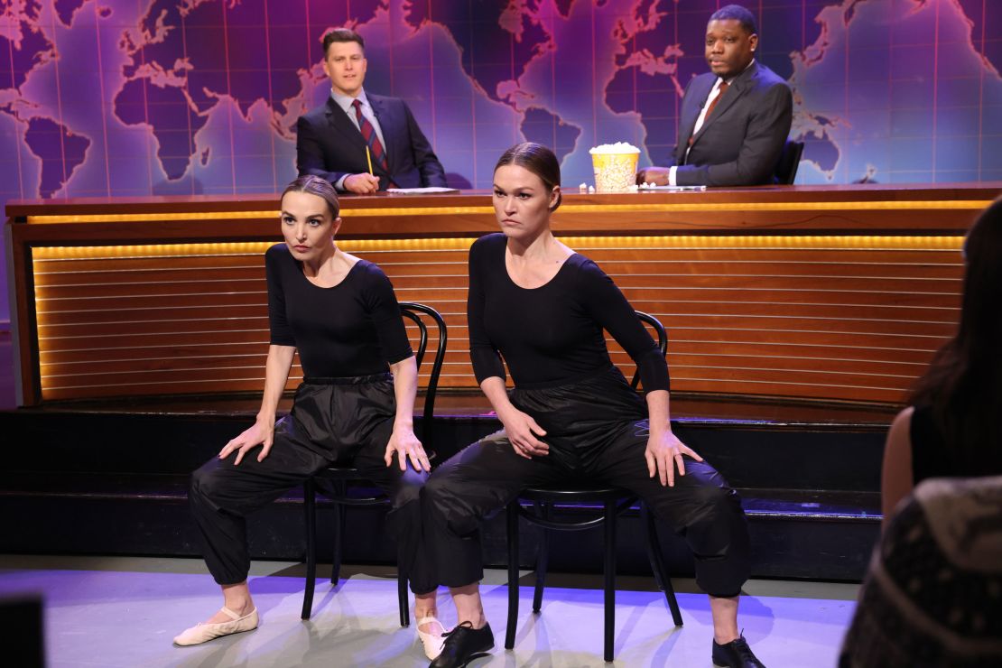 (From left) Colin Jost, Chloe Fineman, Julia Stiles and Michael Che during a 'Weekend Update' sketch on 'Saturday Night Live' in December 2023.