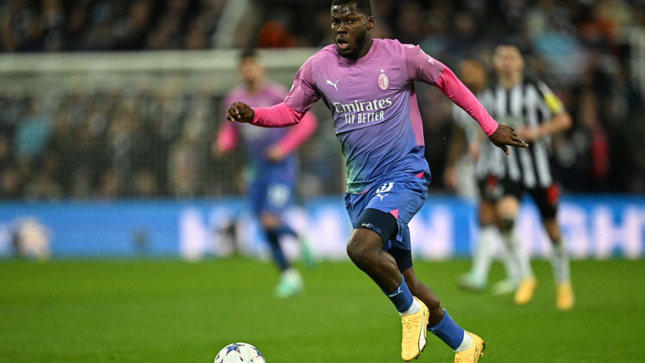 AC Milan's US midfielder #80 Yunus Musah controls the ball during the UEFA Champions League Group F football match between Newcastle United and AC Milan at St James' Park in Newcastle-upon-Tyne, north east England on December 13, 2023. (Photo by Paul ELLIS / AFP) (Photo by PAUL ELLIS/AFP via Getty Images)