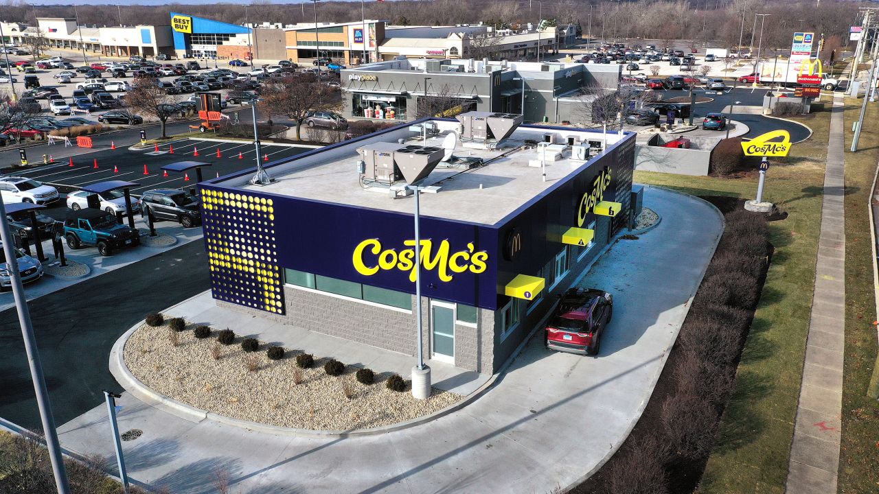 BOLINGBROOK, ILLINOIS - DECEMBER 11: An aerial view shows a CosMc's restaurant, a concept recently launched by McDonald’s on December 11, 2023 in Bolingbrook, Illinois. Lines to order food and beverages at the drive-thru-only restaurant, which opened to the public late last week, have been as long as 6 hours. (Photo by Scott Olson/Getty Images)