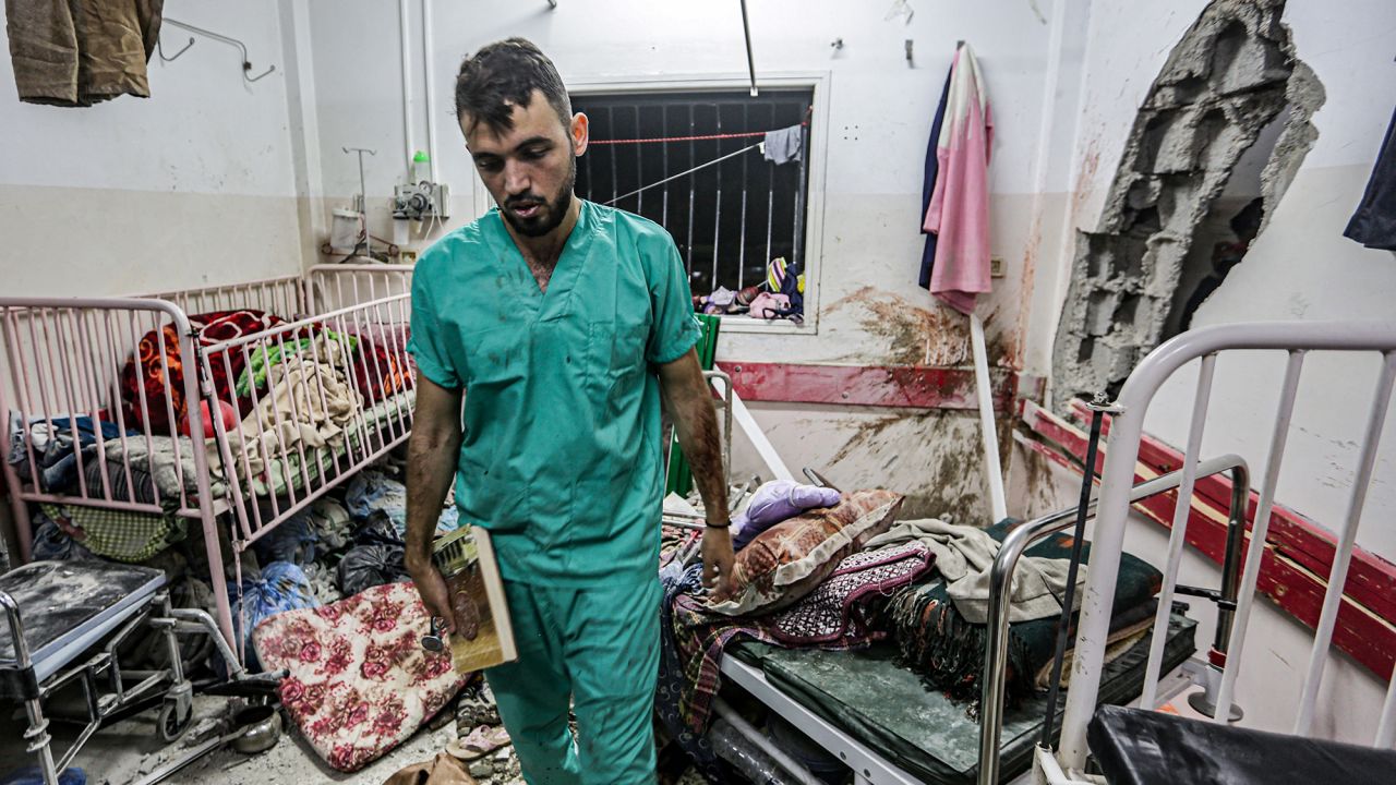 A man inspects the damage in a room following Israeli bombardment at Nasser Hospital in southern Gaza, on December 17.