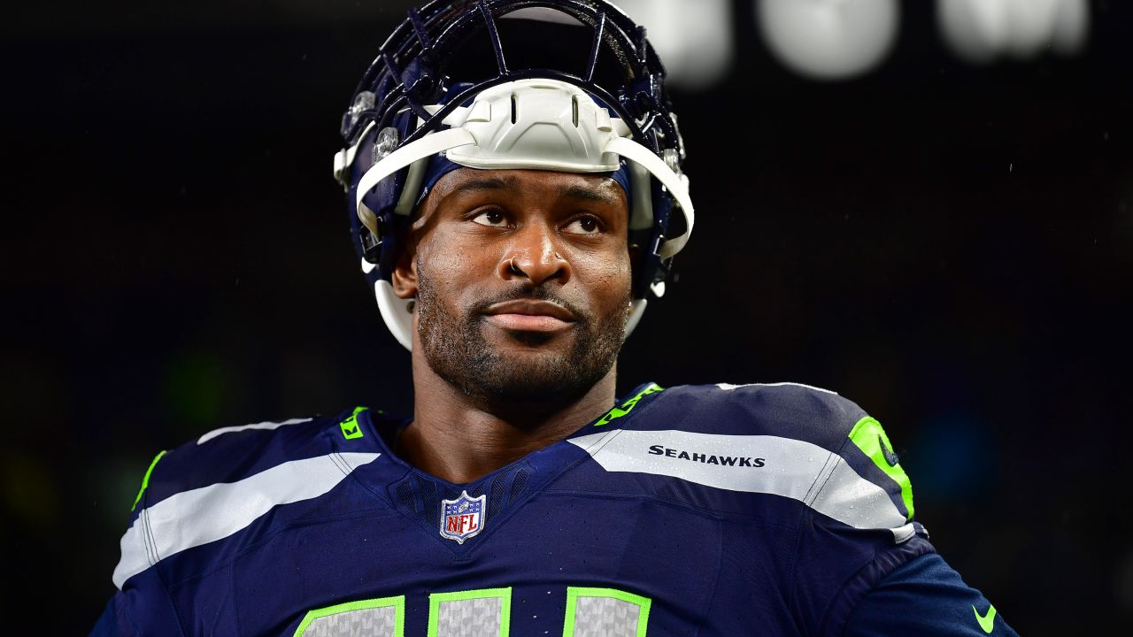 SEATTLE, WASHINGTON - DECEMBER 18: DK Metcalf #14 of the Seattle Seahawks looks on before a game against the Philadelphia Eagles at Lumen Field on December 18, 2023 in Seattle, Washington. (Photo by Jane Gershovich/Getty Images)