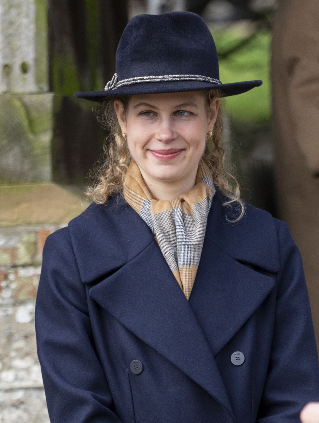 Lady Louise Windsor was also spotted in the scarf, designed by King Charles.