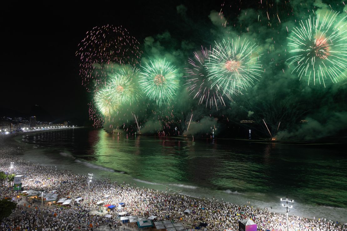 Fireworks are set off over the sea during celebrations at Copacabana Beach in Rio de Janeiro, Brazil, on January 1, 2024.