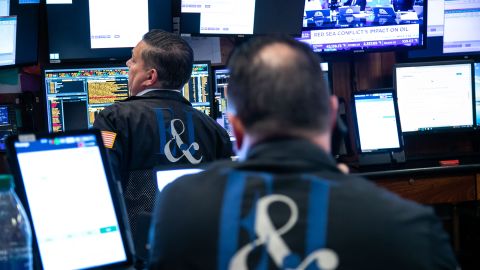 Traders work on the floor of the New York Stock Exchange (NYSE) in New York, US, on Tuesday, Jan. 2, 2023. US stocks are likely to take a breather from their rapid gains before a potential fresh catalyst arrives in the form of the next earnings season, according to Oppenheimer Asset Management.