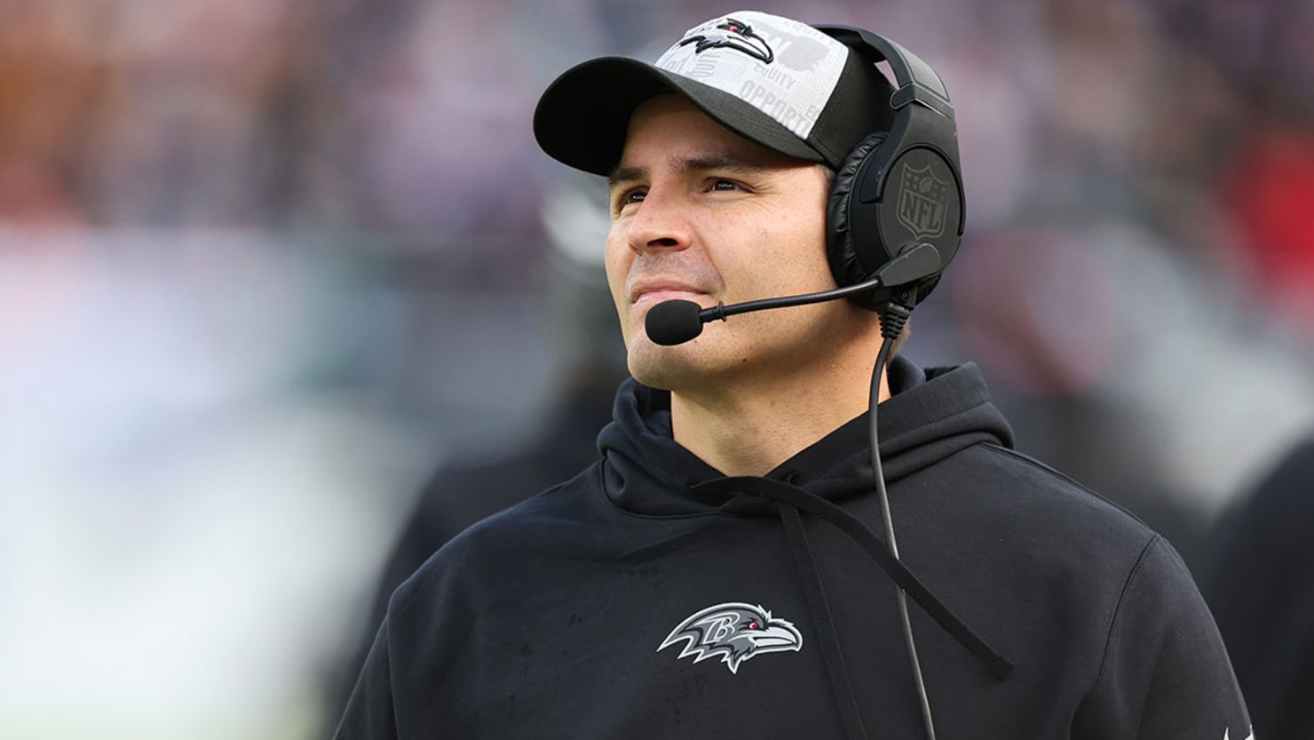 Baltimore Ravens defensive coordinator Mike Macdonald watches his team during the first half of an NFL game on December 31, 2023.