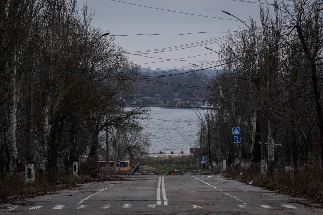 A roadblock is seen on a road leading to the Dnipro River in central Kherson on December 22, 2023.