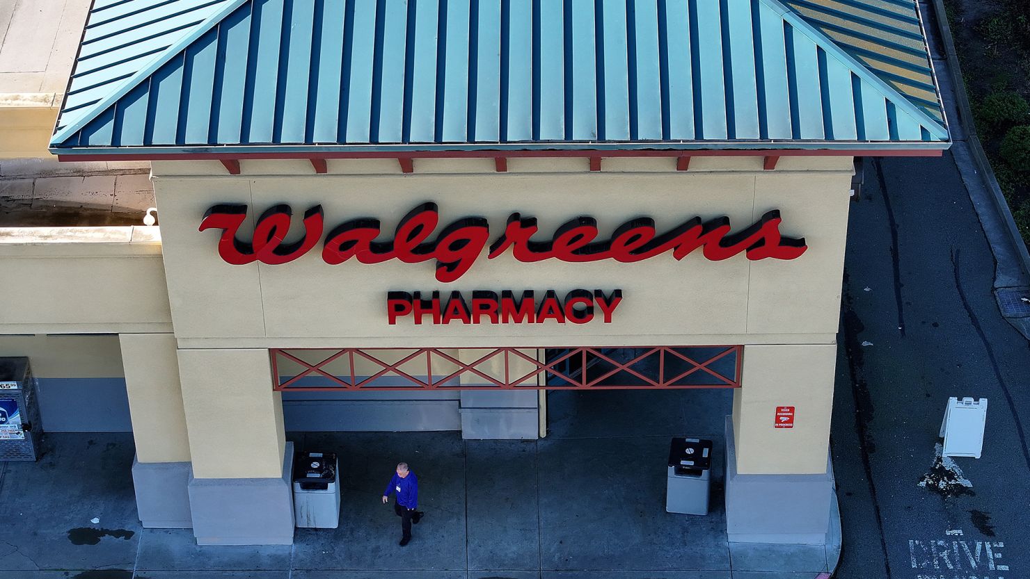 In an aerial view, a customer leaves a Walgreens store on January 04, 2024 in San Pablo, California.