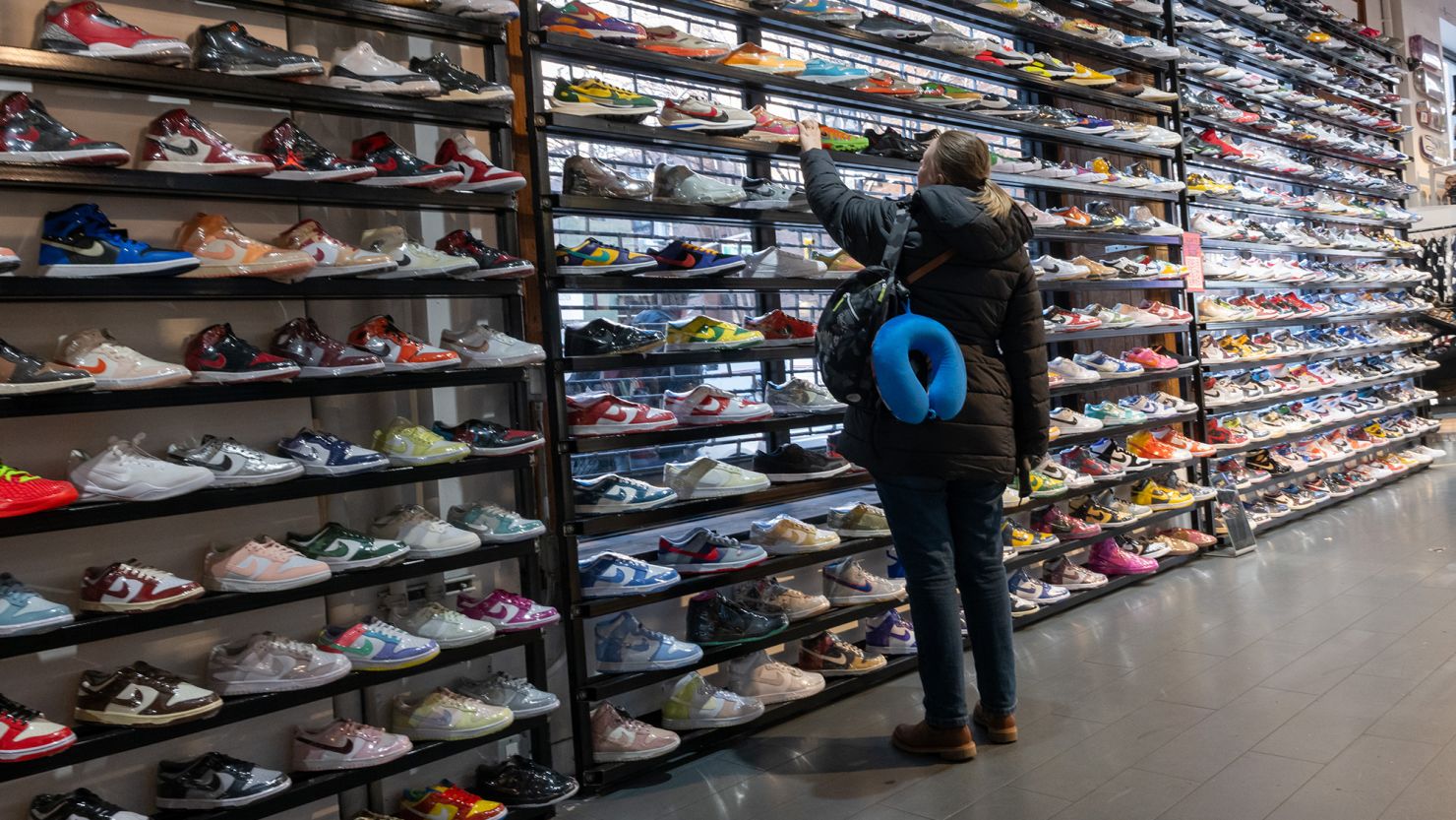 People shop at a retail shoe store in Manhattan on January 5, 2024, in New York City.