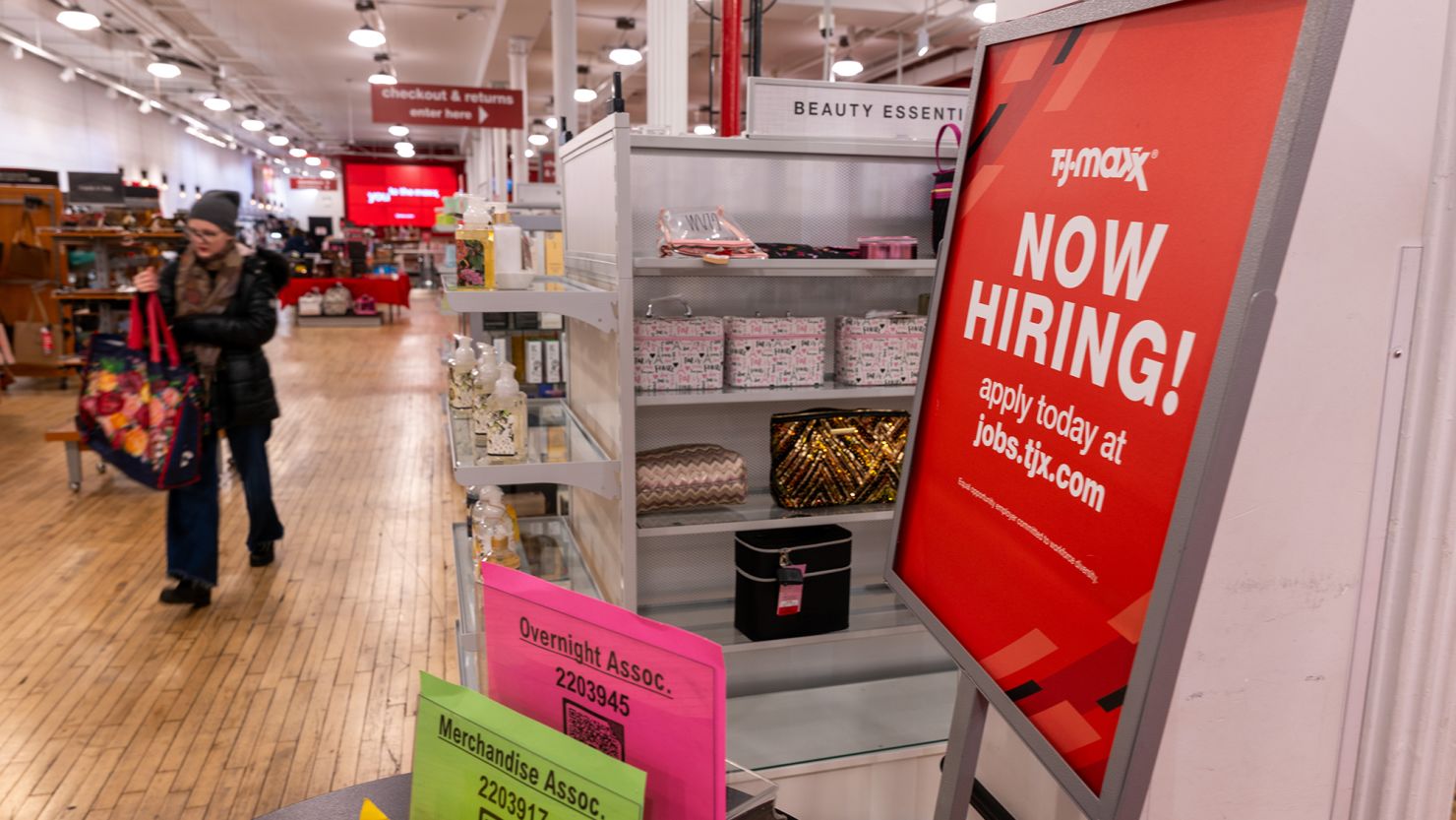 A 'now hiring' sign is displayed in a retail store in Manhattan on January 05, 2024, in New York City. Job growth was strong throughout 2023, and it's expected to remain that way when the latest data is released Friday.