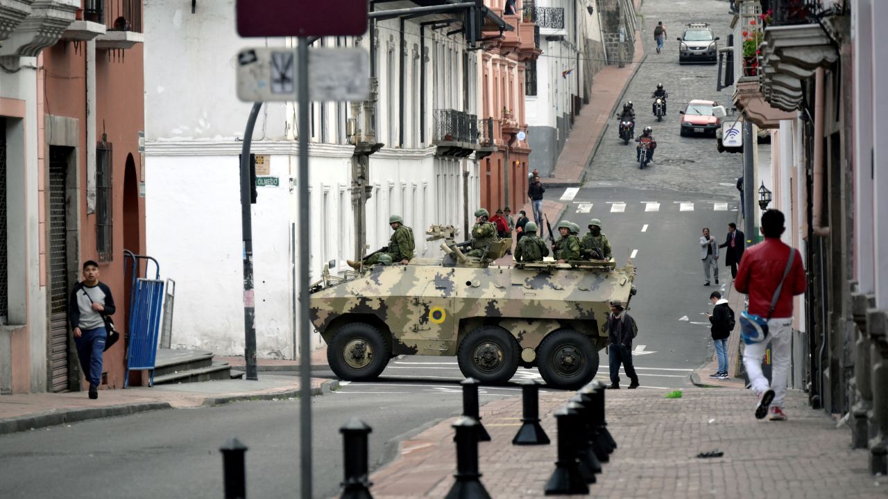 TOPSHOT - Ecuadorean security forces patrol the area around the main square and presidential palace after Ecuadorean President Daniel Noboa declared the country in a state of "internal armed conflict" and ordered the army to carry out military operations against the country's powerful drug gangs, in downtown Quito on January 9, 2024. Ecuador's new president, 36-year-old Daniel Noboa, is grappling with a security nightmare after the escape from prison of one of the country's most high profile gangsters, Jose Adolfo Macias, known as "Fito." (Photo by STRINGER / AFP) (Photo by STRINGER/AFP via Getty Images)