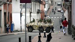 TOPSHOT - Ecuadorean security forces patrol the area around the main square and presidential palace after Ecuadorean President Daniel Noboa declared the country in a state of "internal armed conflict" and ordered the army to carry out military operations against the country's powerful drug gangs, in downtown Quito on January 9, 2024. Ecuador's new president, 36-year-old Daniel Noboa, is grappling with a security nightmare after the escape from prison of one of the country's most high profile gangsters, Jose Adolfo Macias, known as "Fito." (Photo by STRINGER / AFP) (Photo by STRINGER/AFP via Getty Images)