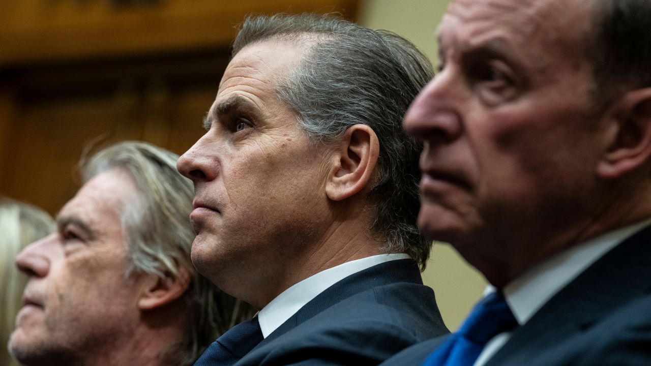 Hunter Biden, son of US President Joe Biden, center, with attorneys Kevin Morris, left, and Abbe Lowell, right, during a House Oversight Committee markup on Capitol Hill in Washington, DC, US, on Wednesday, Jan. 10, 2024. The House Judiciary and Oversight committees are expected to recommend that the president's son be held in criminal contempt of Congress for refusing to comply with a subpoena in the ongoing impeachment inquiry into his father, President Joe Biden. Photographer: Graeme Sloan/Bloomberg via Getty Images