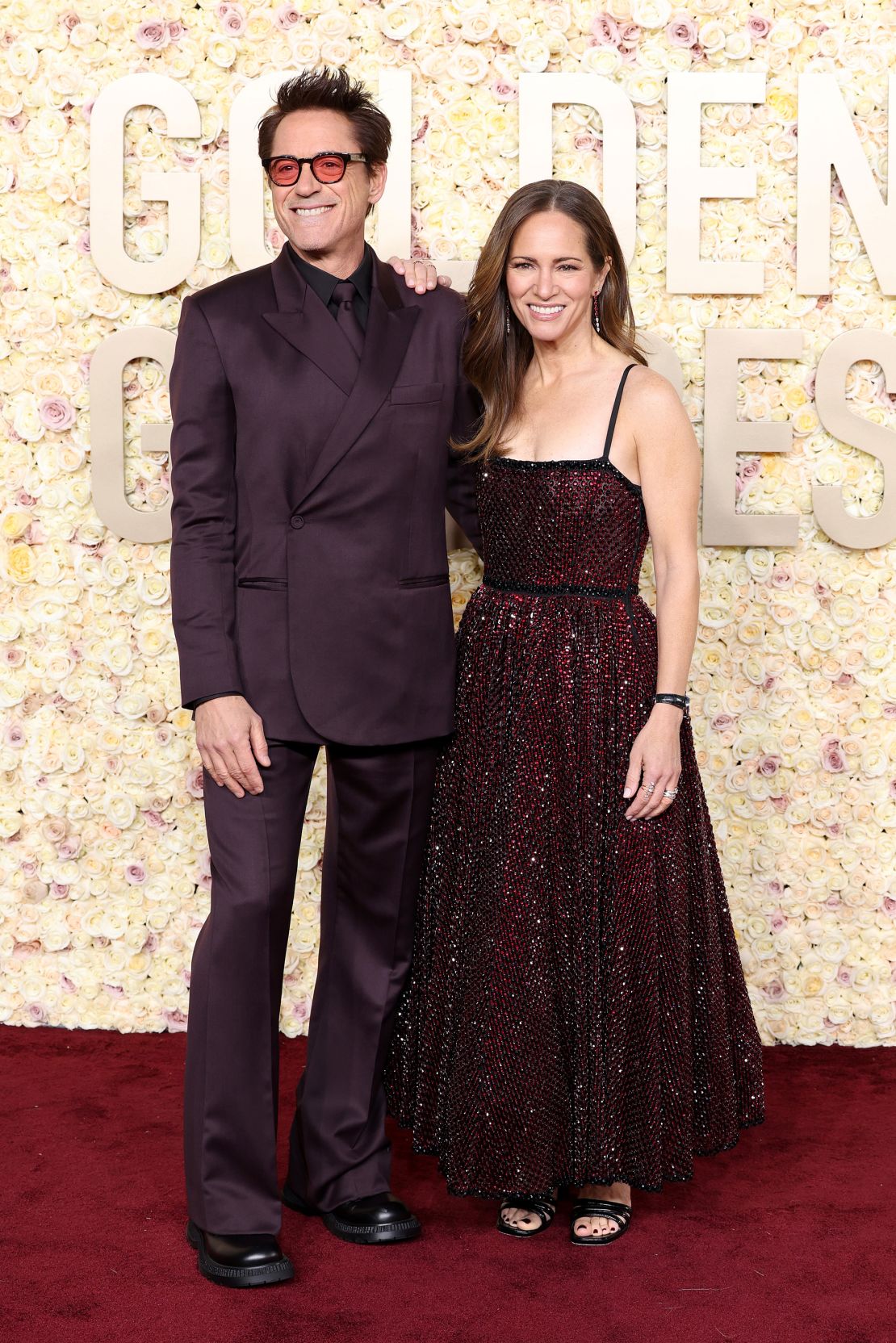 Actor Robert Downey Jr. was looking at the world through rose-tinted glasses as he and wife Susan Downey wore complementary ensembles by Dior.