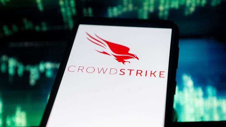 In this photo illustration a Crowdstrike logo seen displayed on a smartphone.