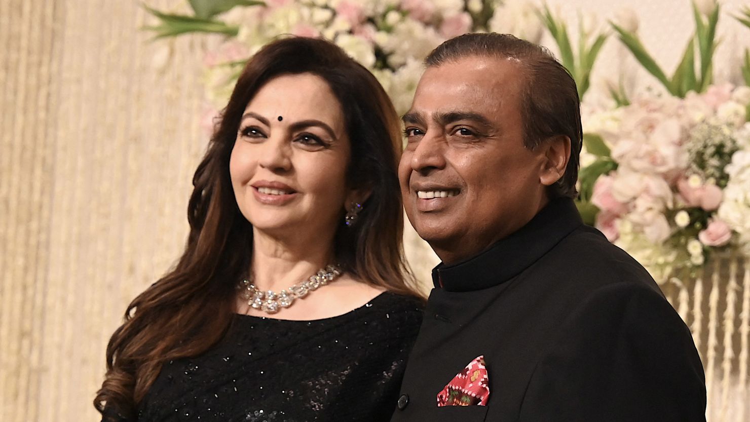Indian billionaire businessman Mukesh Ambani with his wife and founder chairperson of the Reliance Foundation Nita M. Ambani.
