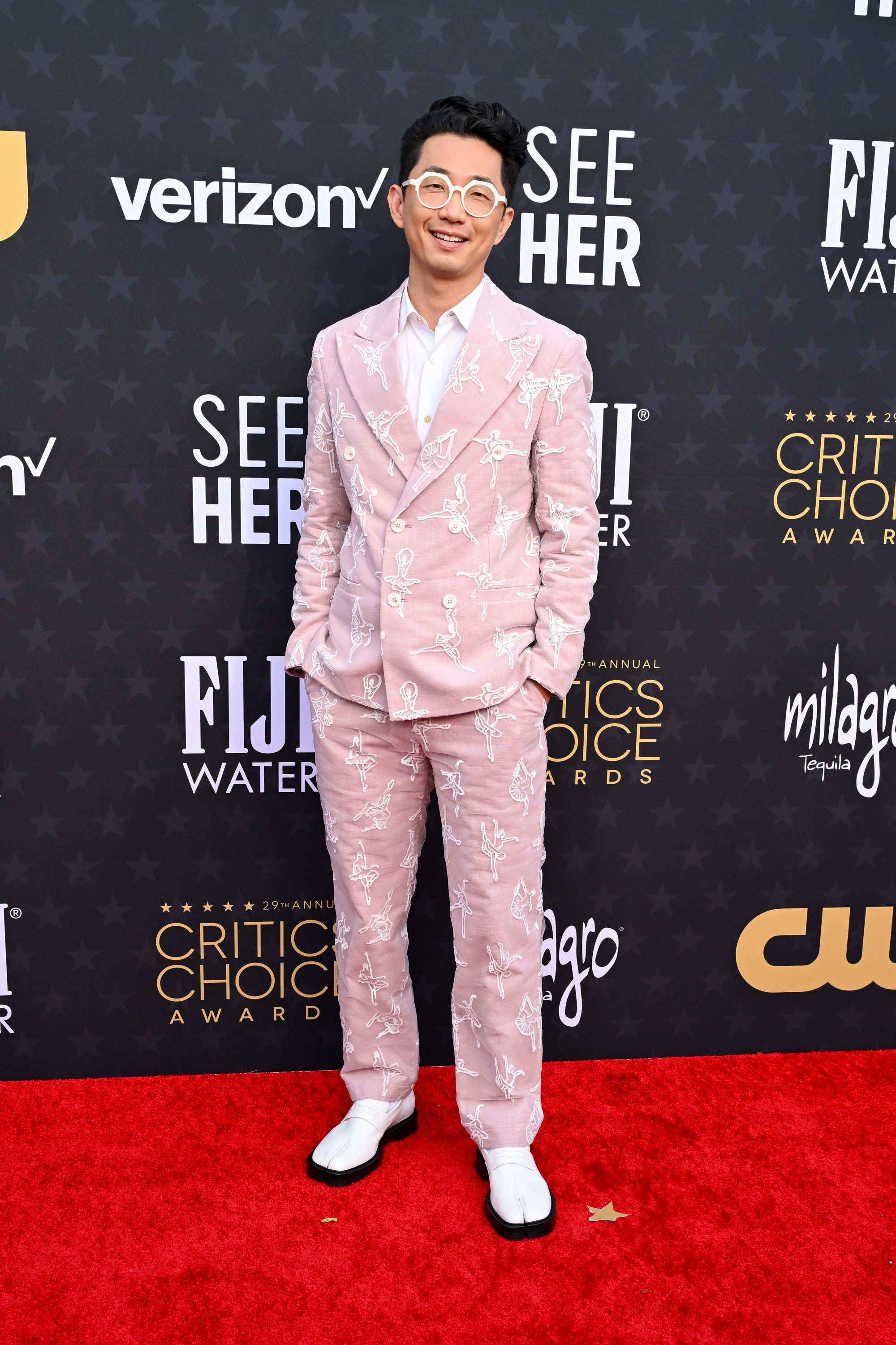 “Beef” creator Lee Sung Jin wore a playful baby pink suit embroidered with ballerinas, as well as a pair of Maison Margiela Tabi leather loafers.