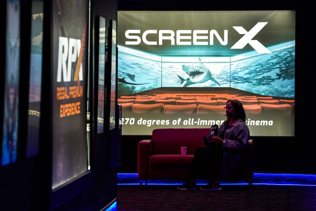 HOUSTON, TEXAS - DECEMBER 26: Screen X, a 270-degree moving screen, is advertised in the lobby at Regal MarqE Cinema. (Brett Coomer/Houston Chronicle via Getty Images)