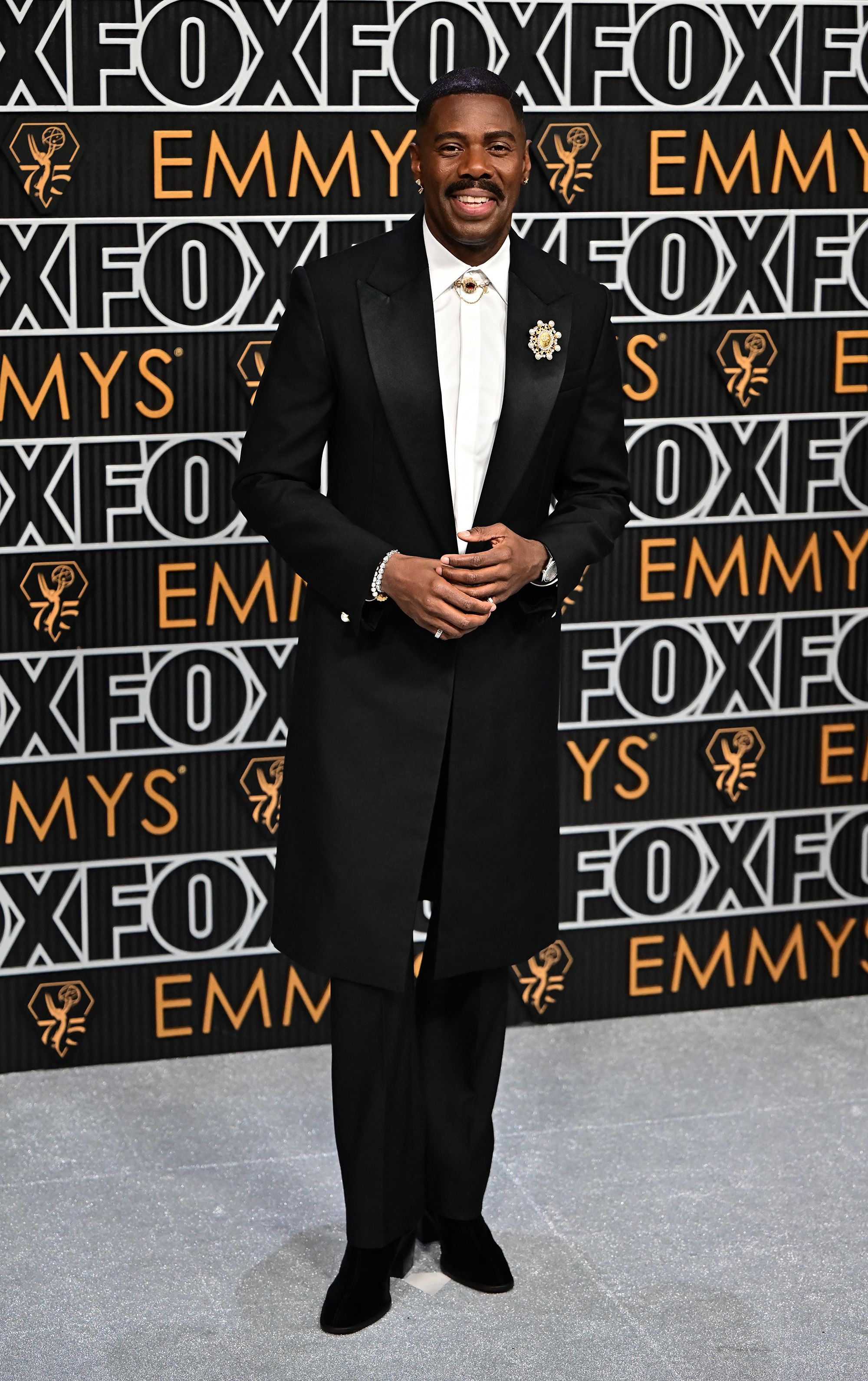 One of the standout performers on the awards season red carpet so far, “Rustin” and “The Color Purple” actor Colman Domingo, arrived in a custom Louis Vuitton suit.