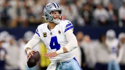 ARLINGTON, TEXAS - JANUARY 14: Dak Prescott #4 of the Dallas Cowboys drops back to pass during the first quarter of the NFC Wild Card Playoff game against the Green Bay Packers at AT&T Stadium on January 14, 2024 in Arlington, Texas. (Photo by Ron Jenkins/Getty Images)