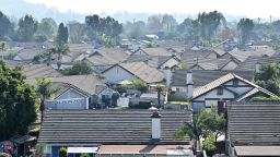 Rooftops of homes in a gated residential community are seen in Pico Rivera, California on January 18, 2024.