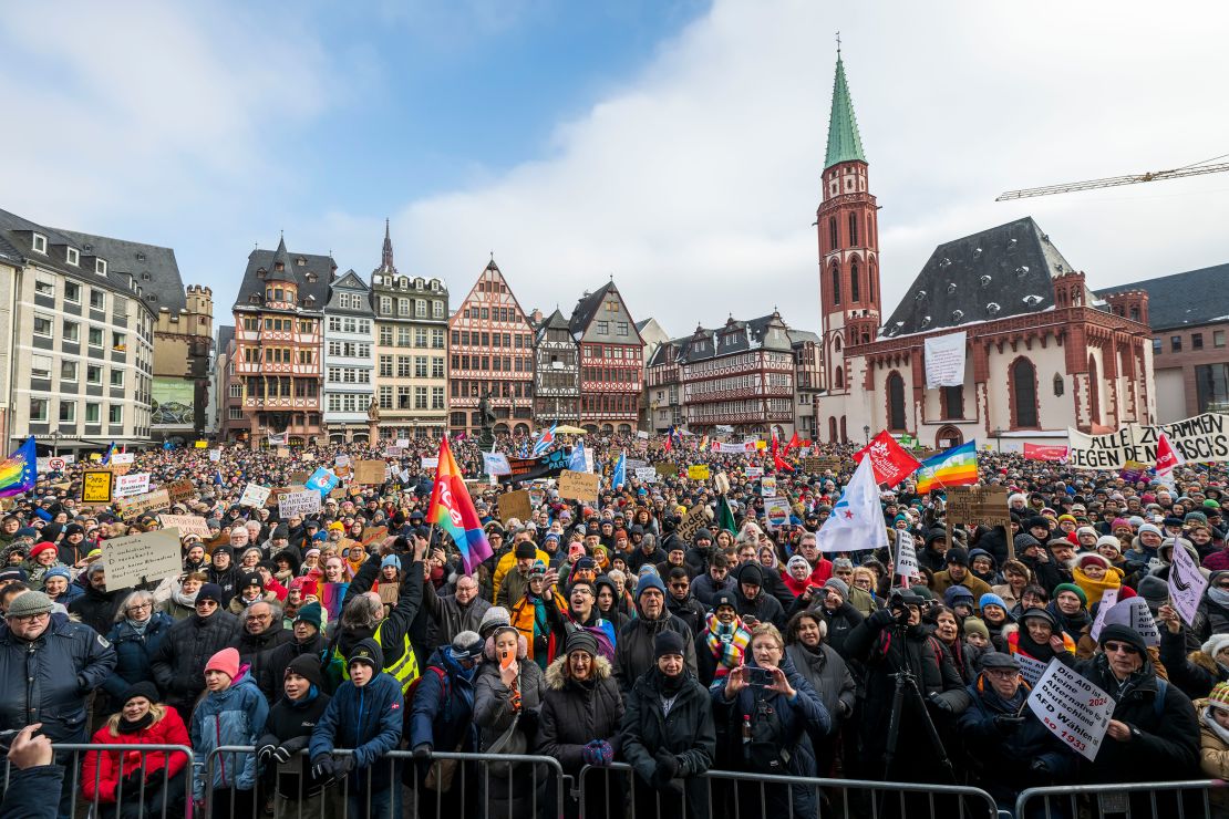 People gather to protest against the AfD on January 20, 2024 in Frankfurt, Germany.