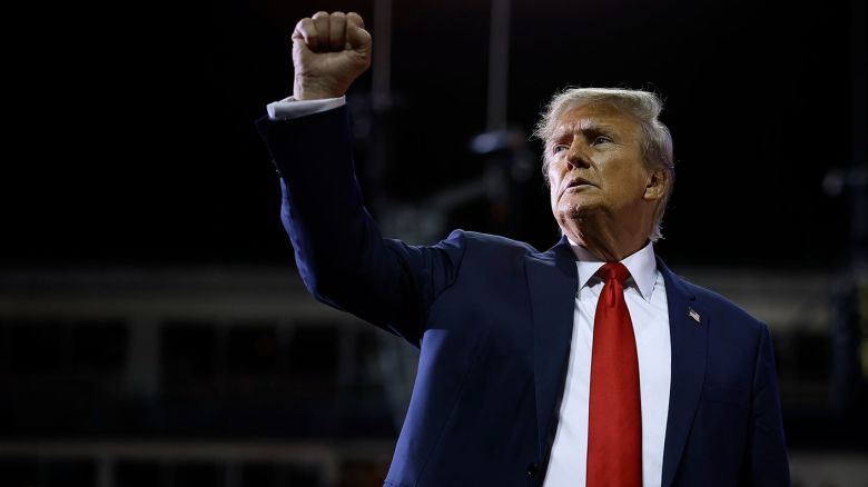 Former President Donald Trump acknowledges supporters as he leaves the stage at the conclusion of a campaign rally at the SNHU Arena on January 20, 2024 in Manchester, New Hampshire.