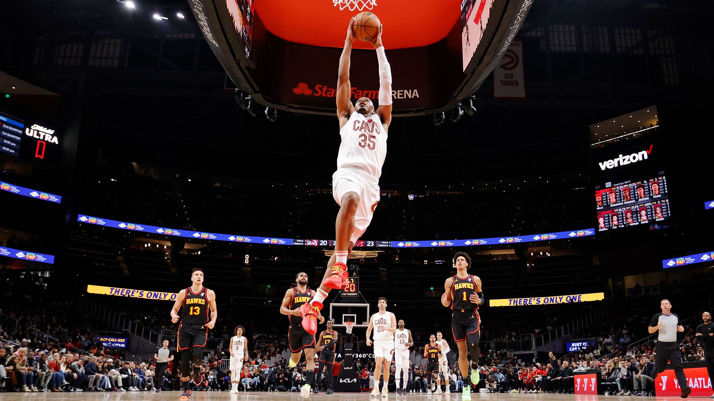 Tristan Thompson #13 of the Cleveland Cavaliers scores over the Atlanta Hawks during the first half at State Farm Arena on January 20, 2024 in Atlanta, Georgia.