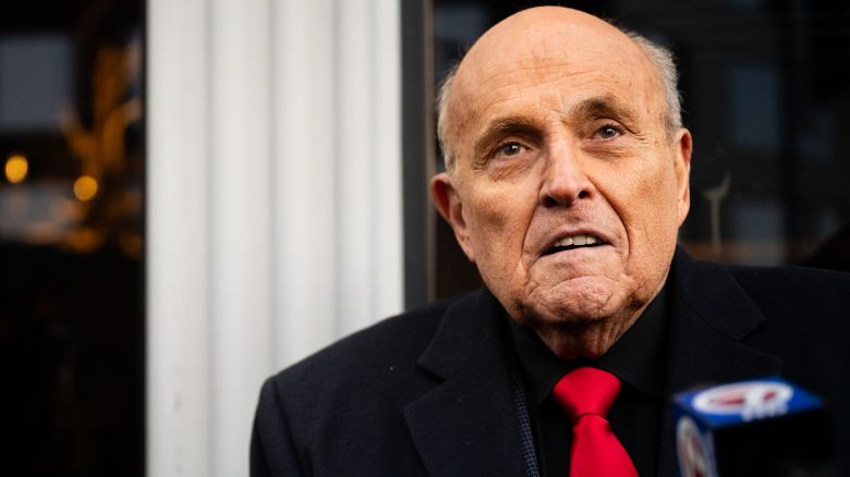 Rudy Giuliani speaks to members of the media where Republican candidate Florida Gov. Ron DeSantis was scheduled to host a campaign event on January 21, 2024 in Manchester, New Hampshire.