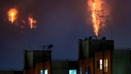 Flames rise from a forest during a wildfire in Bogota on January 24.