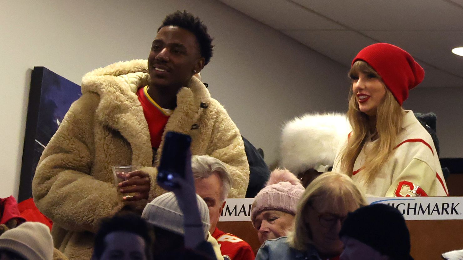 Jerrod Carmichael and Taylor Swift at an NFL game in January.