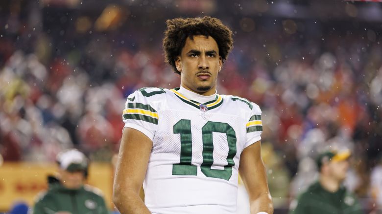 SANTA CLARA, CALIFORNIA - JANUARY 20: Jordan Love #10 of the Green Bay Packers looks on from the sideline before an NFC divisional round playoff football game against the San Francisco 49ers at Levi's Stadium on January 20, 2024 in Santa Clara, California. (Photo by Ryan Kang/Getty Images)