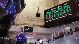 Traders work on the floor of the New York Stock Exchange during afternoon trading on January 22, 2024.